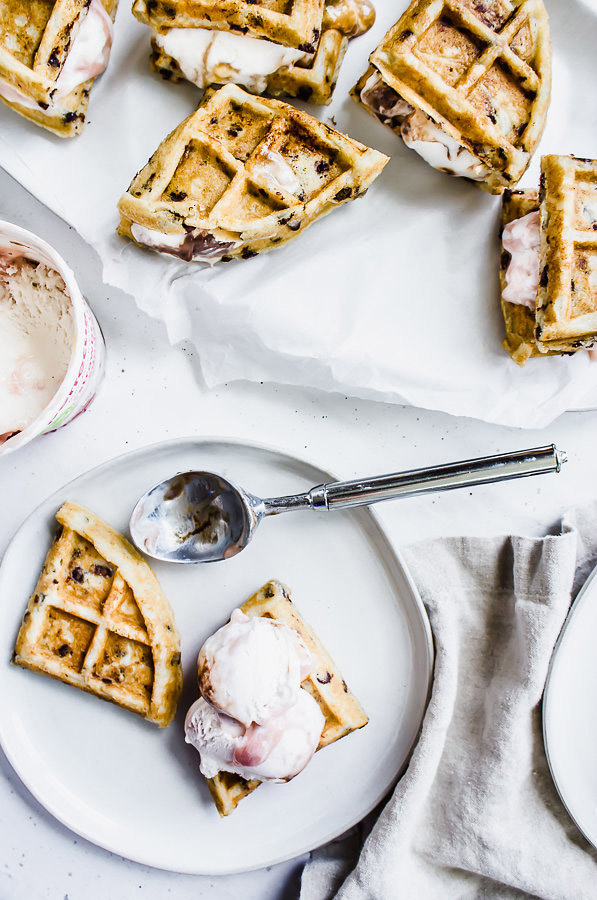 Overhead view of waffle ice cream sandwiches with a spoon